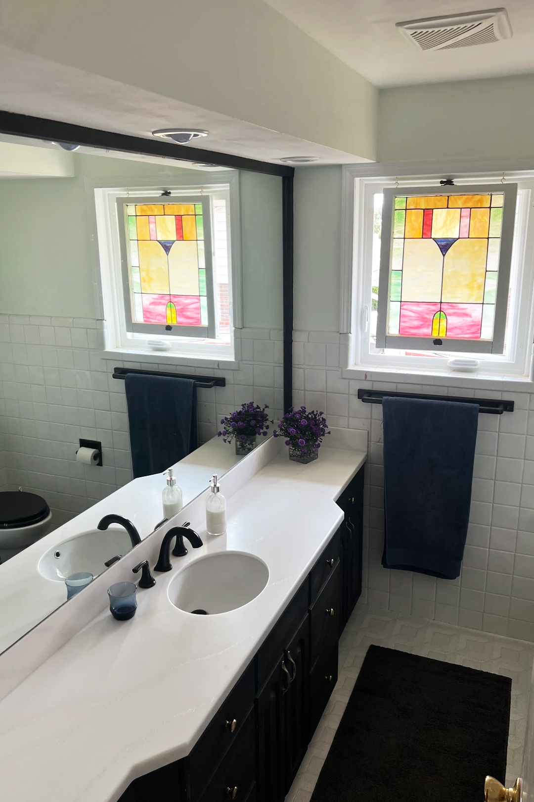 black-vanity-white-marble-countertop
